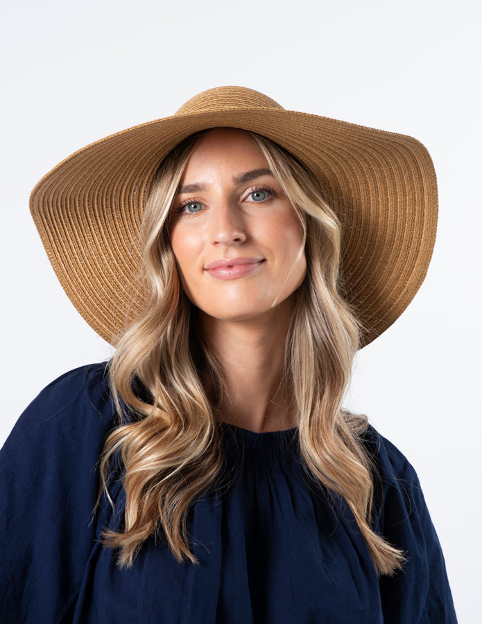 STRAW HAT WITH RAFFIA BOW AND BRONZE BEADS